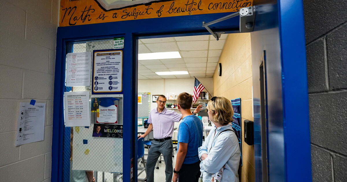 Math teacher Andrew Skinner greets students a week before classes resume at Martensdale-St.Marys in August 2025. Like many Iowa school districts that follow a four-day school week, Martensdale-St.Marys is small (with only about 500 students) and rural.