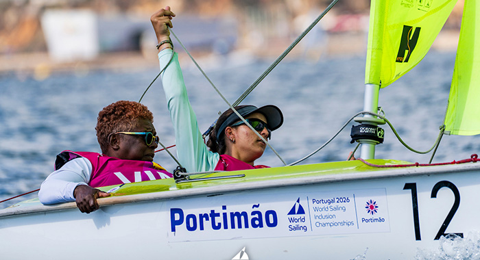 Visually impaired Vincentian sailor, Lorna Bacchus, at the helm, crewed by Sacrlett Hadely at the 2026 World Sailing Inclusion Championship in Portugal. Photo: Vela Solidária